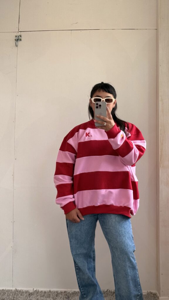 Buzo a rayas rojo y rosa